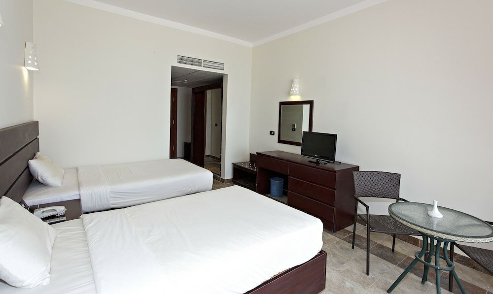 Фото The Three Corners Equinox Beach Resort