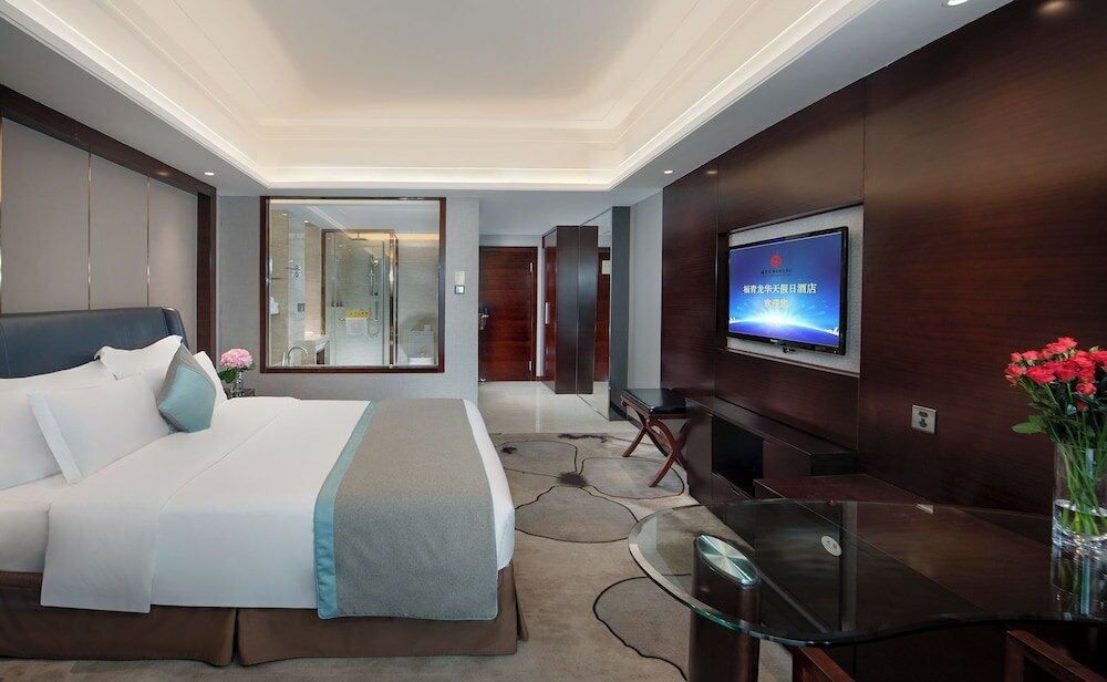 Фото Fuqinglong Huatian Holiday Hotel