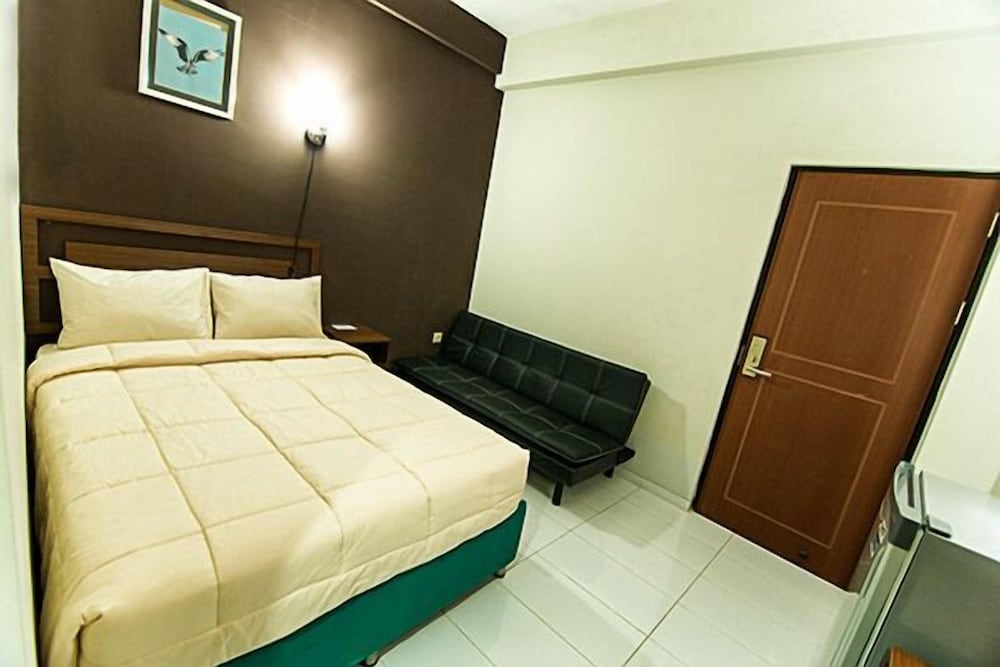Фото Grace Setia Hotel