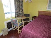 Фото Travel Eagle Inn Motel