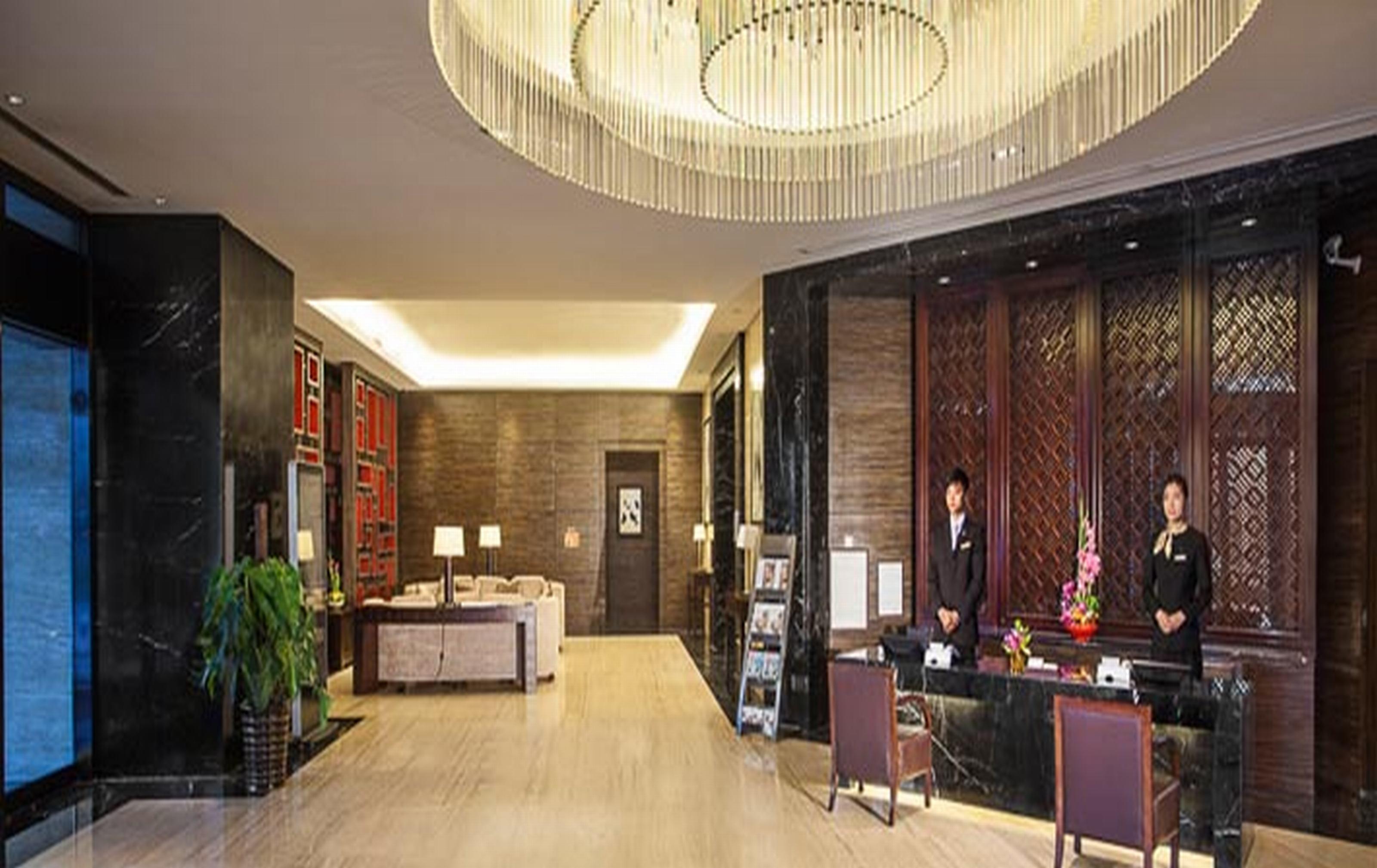 Фото Somerset Grand Central Dalian