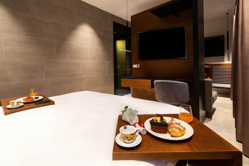 Фото The Corner Duomo Hotel