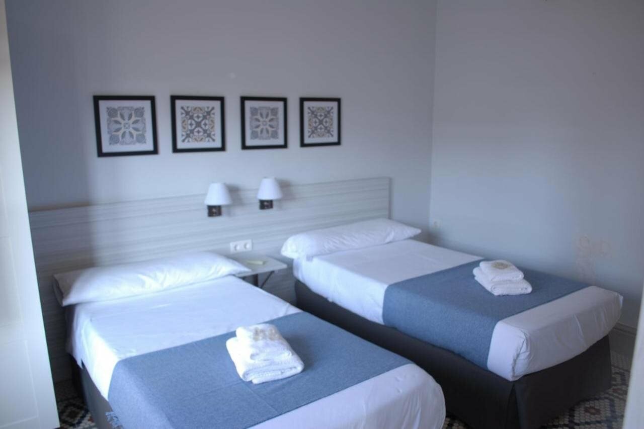 Фото La Perla Granada Suites