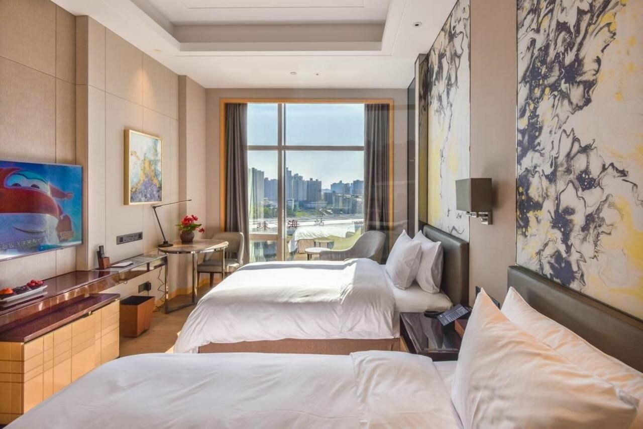 Фото Zhuhai LongZhuDa International Hotel