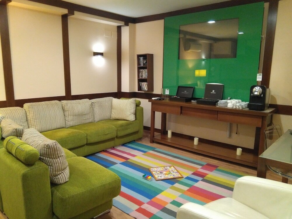 Фото Suites Gran VIA 44 Apartahotel