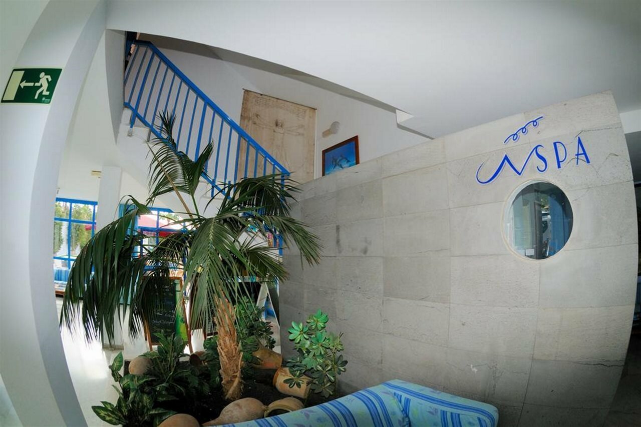 Фото Apartahotel Costa Volcán