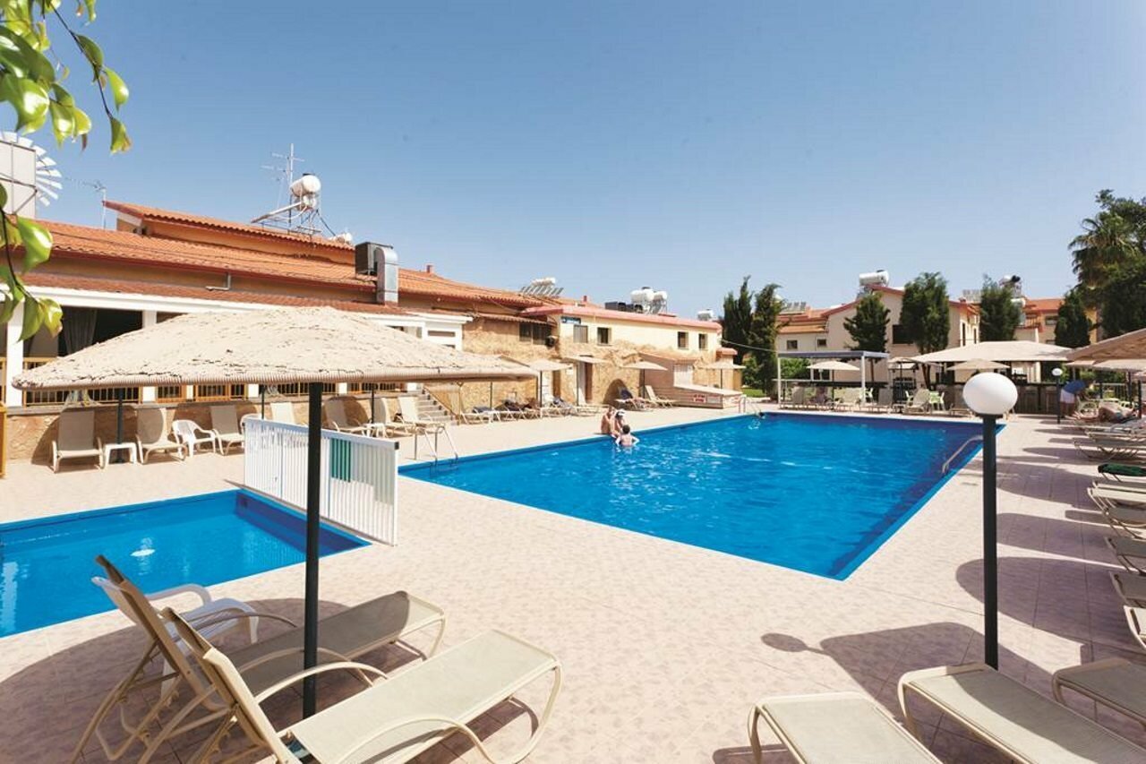 Фото Windmills Hotel Apartments