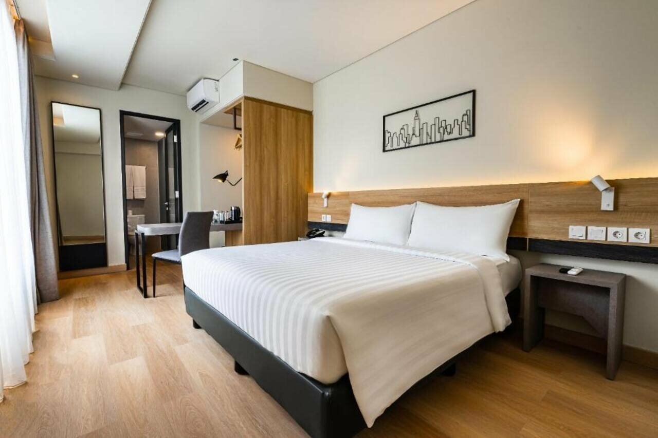 Фото Отель Quest Hotel Prime Pemuda