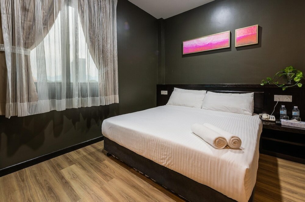 Фото Wang's Hotel Gurney Drive