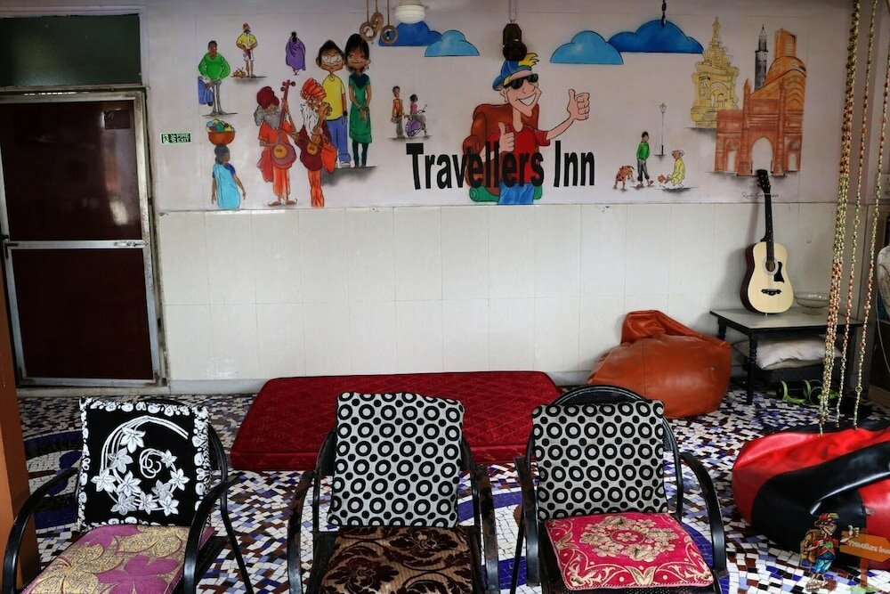 Фото Travellers Inn Mumbai