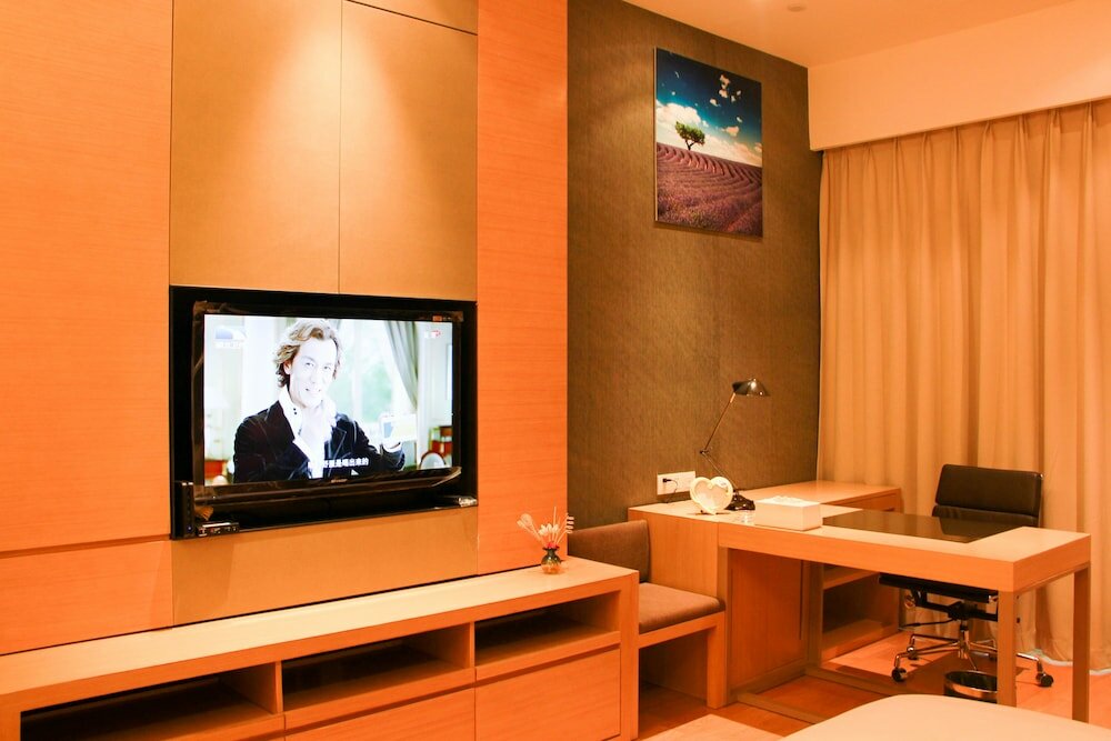 Фото Xingyi International Hotel Poly Store