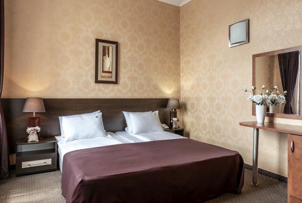 Фото Maxim Boutique Hotel