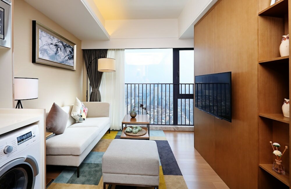 Фото Yuwa Serviced ApartHotel