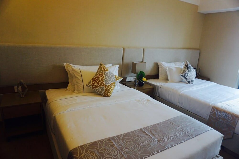 Фото Yuwa Serviced ApartHotel