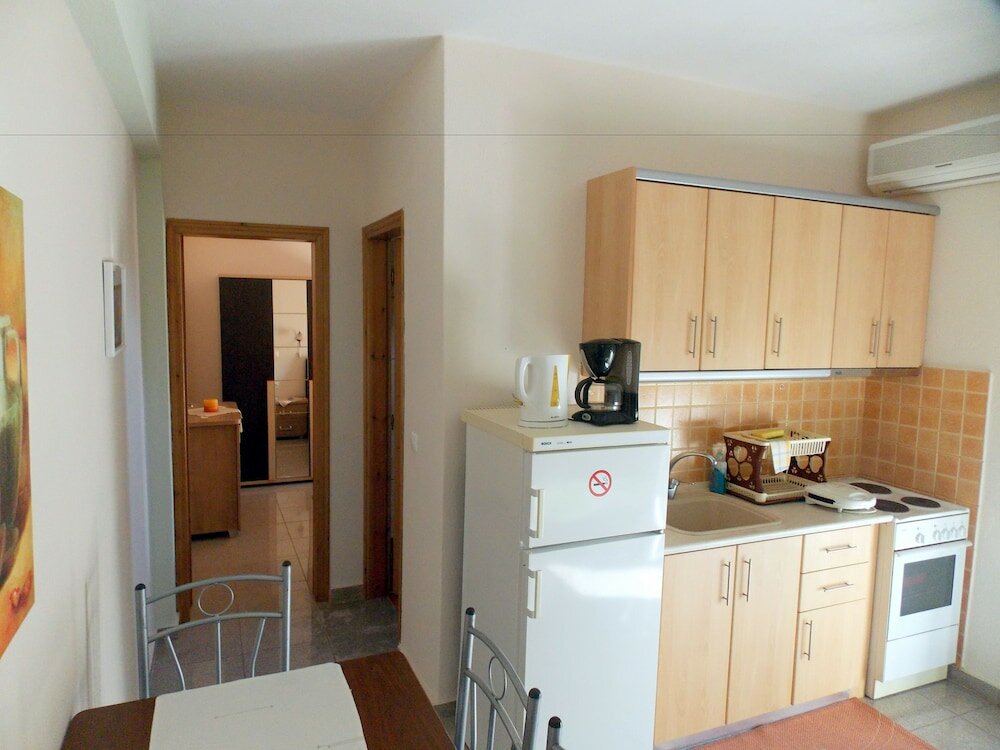 Фото Nikos Apartments