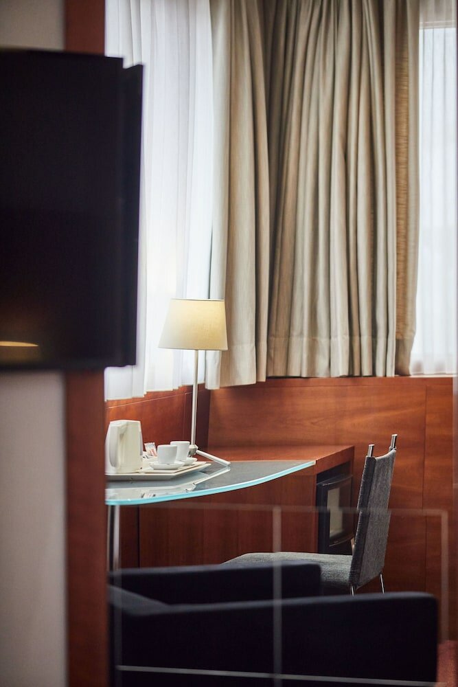 Фото Hotel Silken Ciudad Gijon