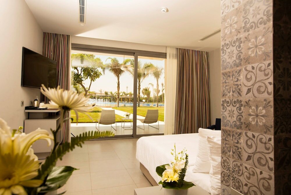 Фото Dusit Thani Lake View Cairo