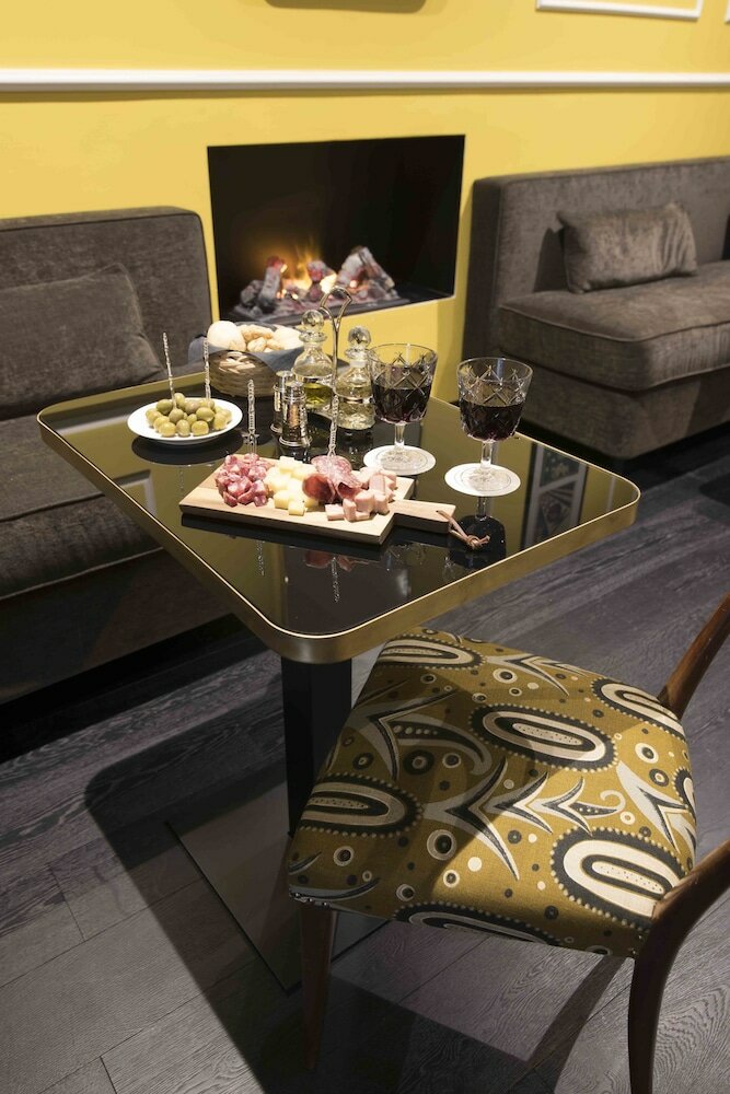 Фото Caruso Place Boutique & Wellness Suites