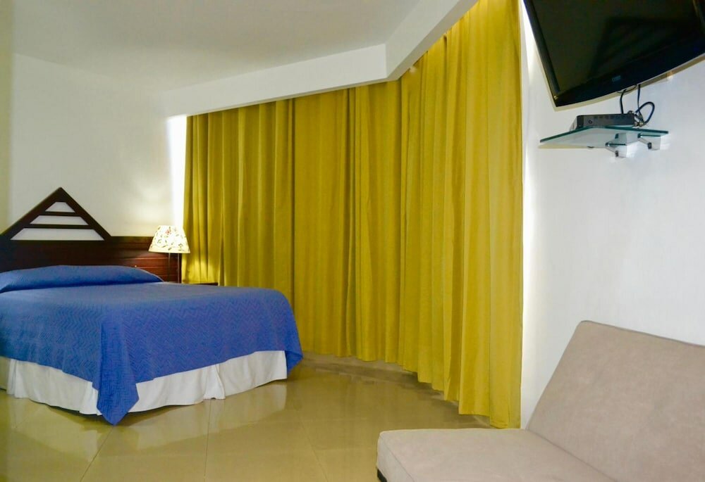 Фото Aparta Hotel Plaza del Sol