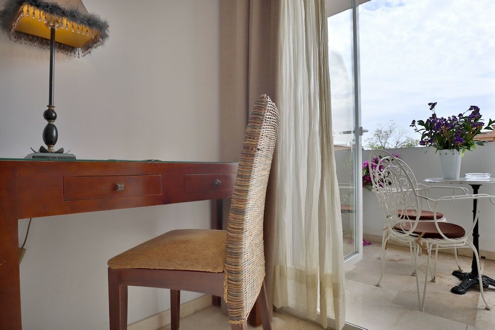 Фото Oasis Cordoba Hotel