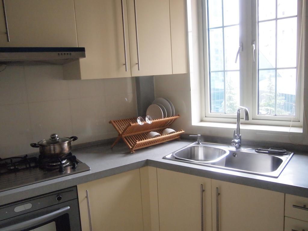 Фото Ladoll Service Apartments Shanghai