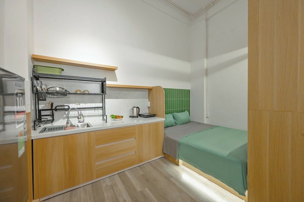 Фото Q Hotel & Apartment