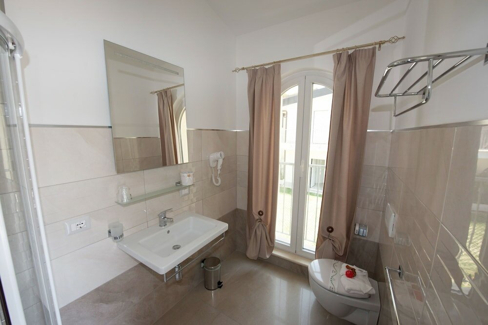 Фото Borgo degli Dei - Affittacamere Poseidone