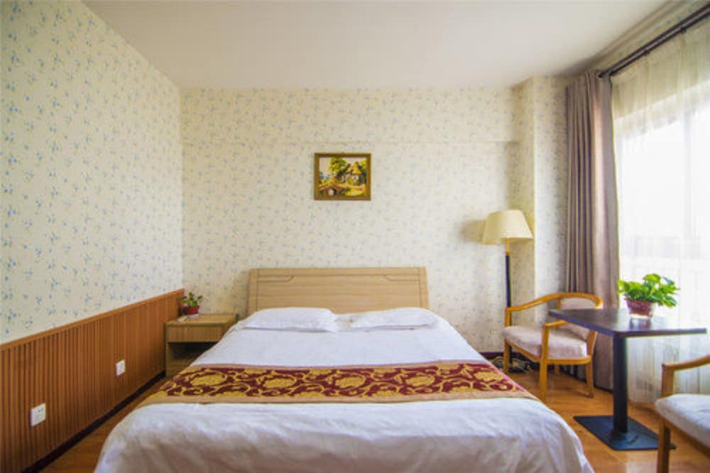 Фото Xian Golden Tree Business Hotel