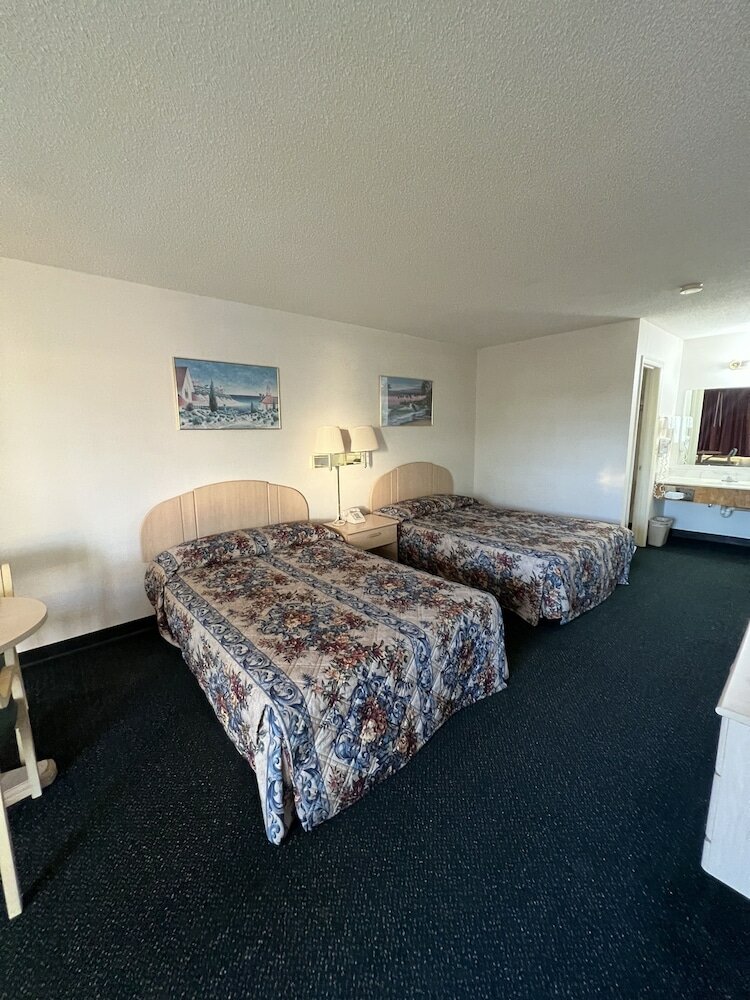 Фото Garden Inn & Suites