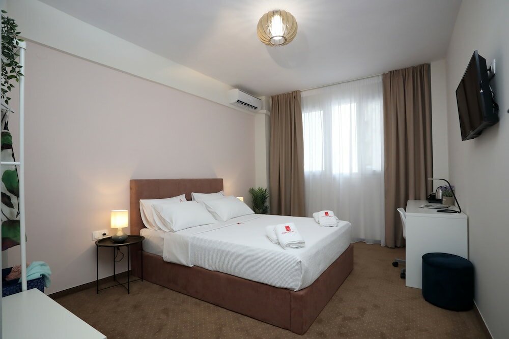 Фото City Plaza Apartments & Rooms