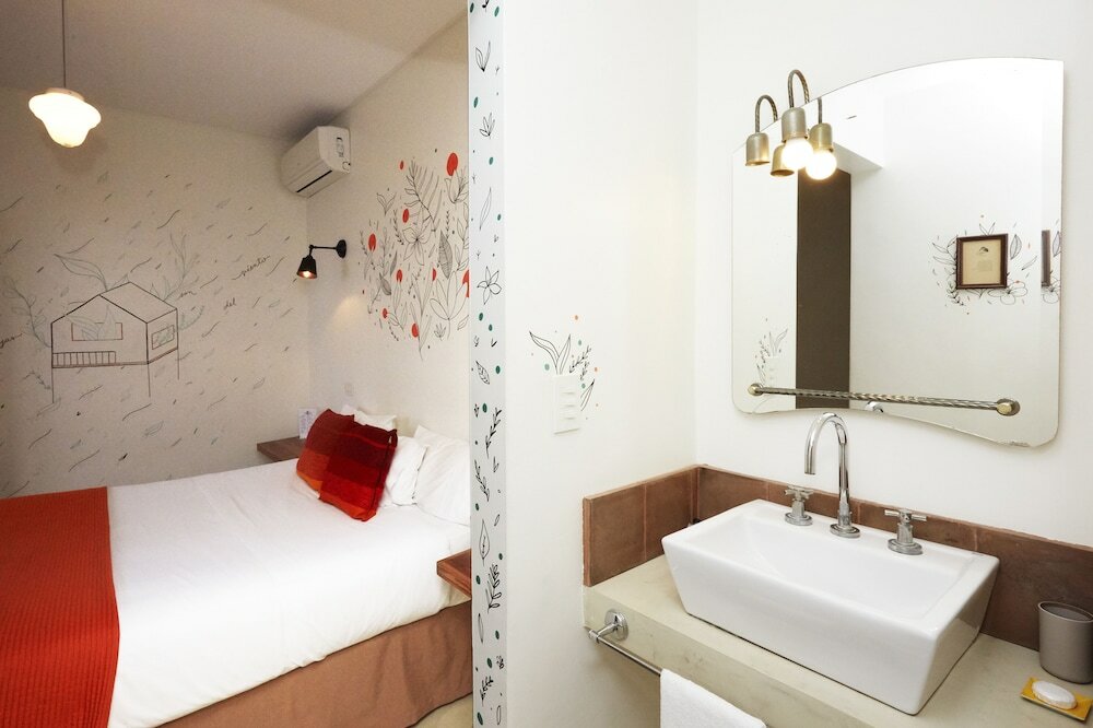 Фото L'Adresse Hotel Boutique