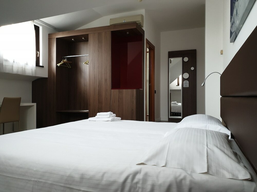 Фото Albergo Delle Alpi