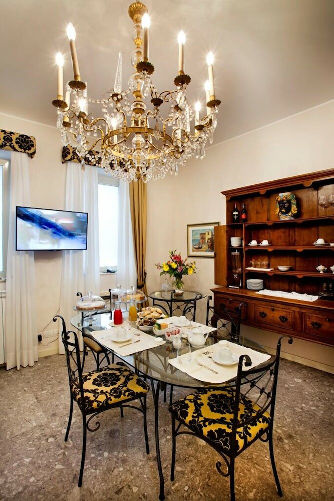 Фото Porta Di Mezzo Luxury B&b