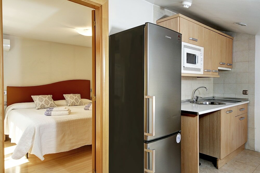 Фото Apartamentos Turísticos Centro