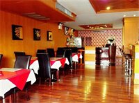 Фото Dynasty Inn Hotel