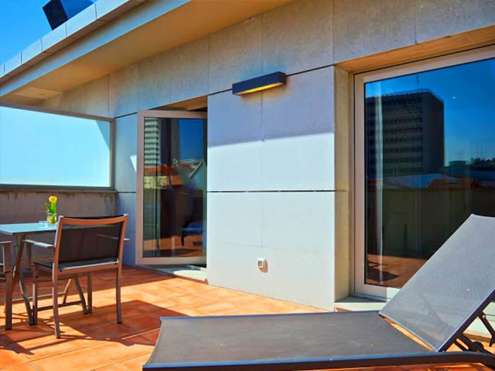 Фото Suites Viena Plaza de Espana