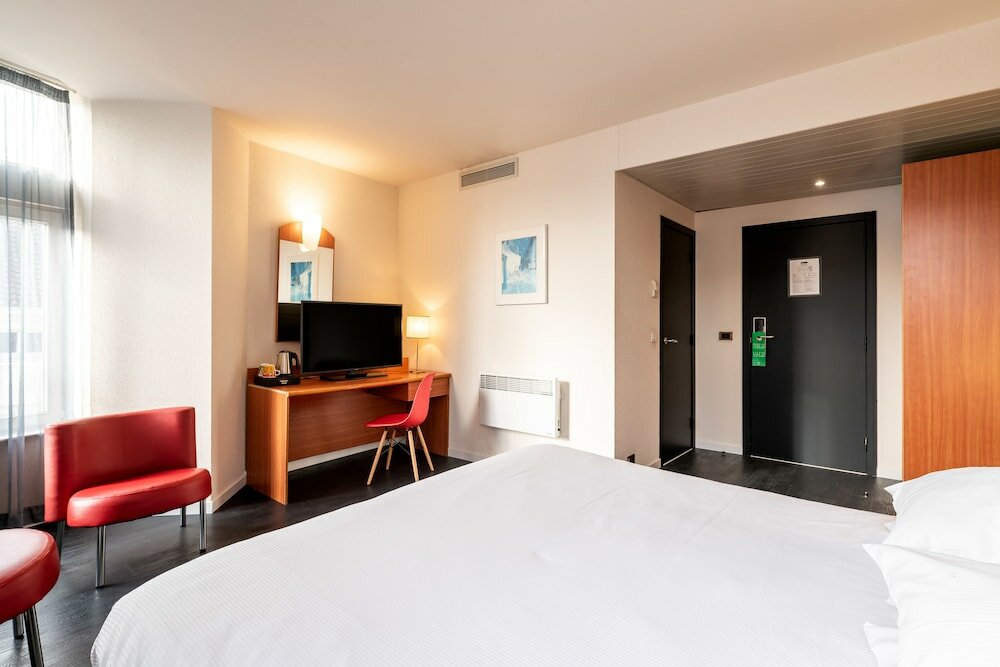 Фото Aris Grand-Place Hotel