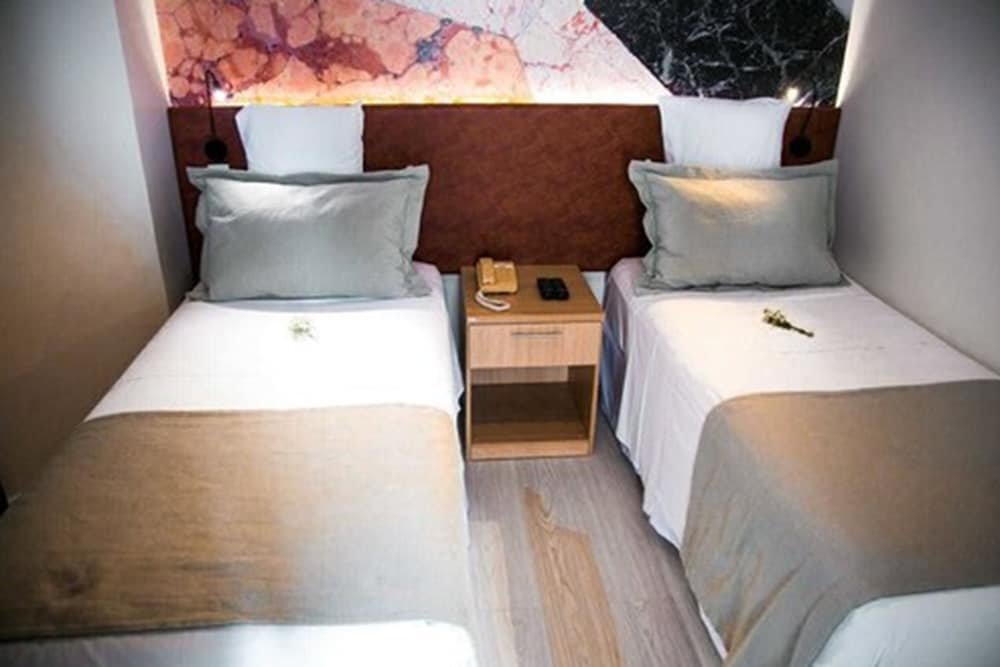 Фото Cosmopolitan Praia Flat