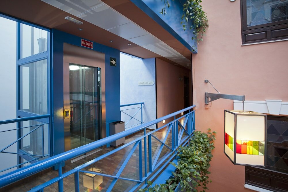 Фото Suites Gran VIA 44 Apartahotel