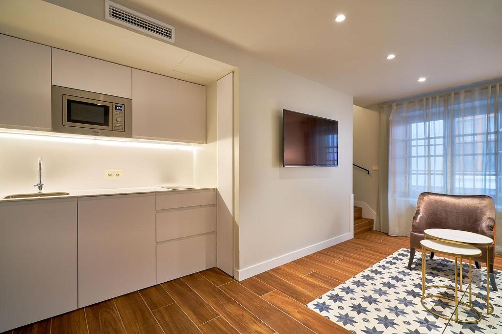 Фото Tandem Torres De Cádiz Suites