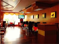 Фото Dynasty Inn Hotel