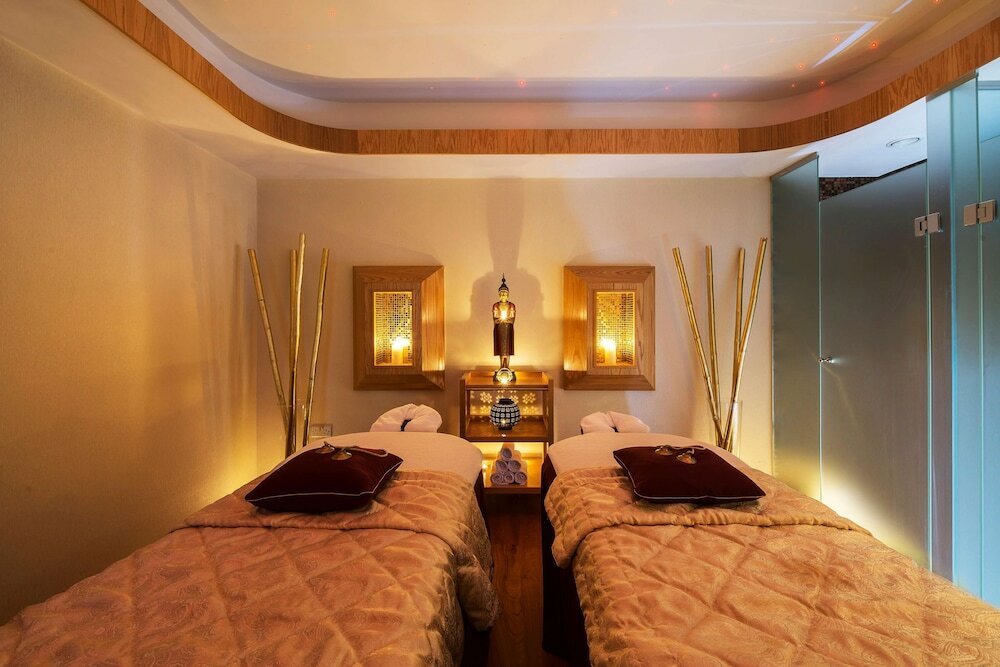 Фото Constantinou Bros Athena Royal Beach Hotel