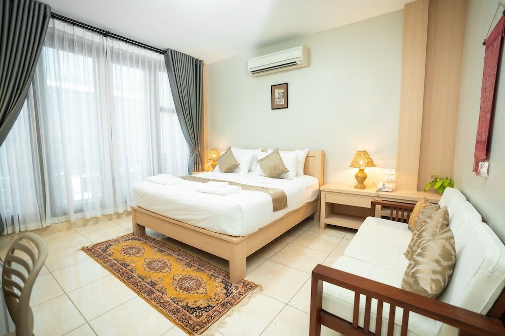 Фото Vongkhamsene Boutique Hotel