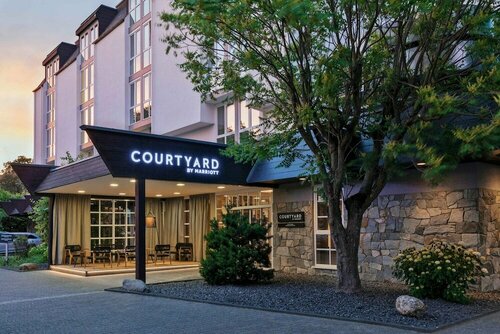 Внешний вид отеля Courtyard by Marriott Wiesbaden-Nordenstadt в Висбадене, фото 2