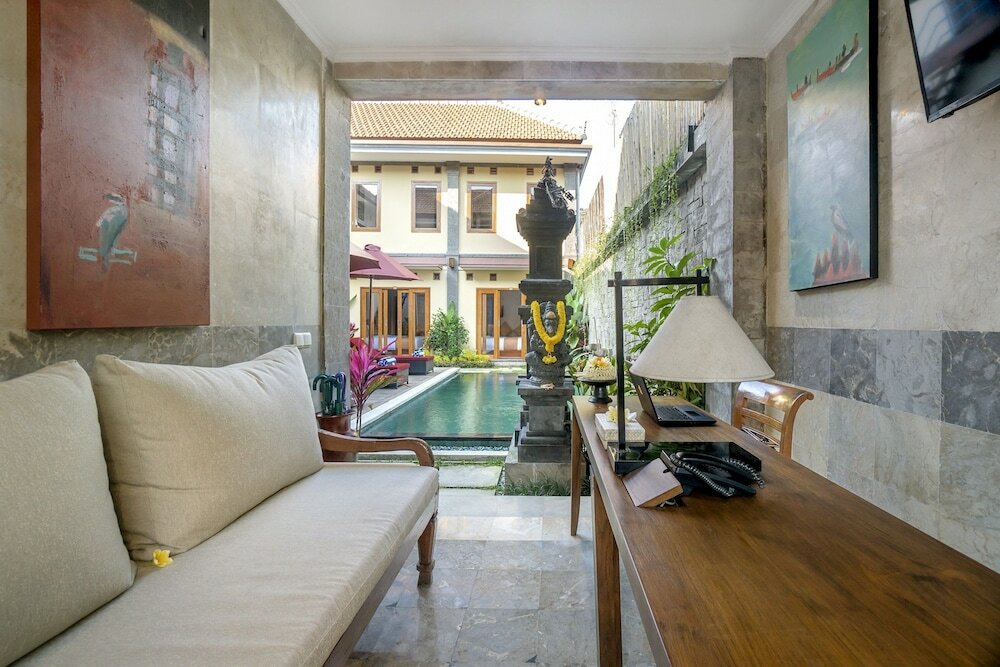 Фото Hartaning House by Pramana Villas