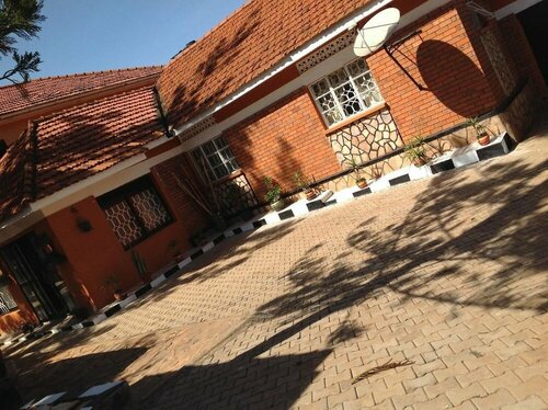 Гостиница Amari Comfort Homes в Кампале