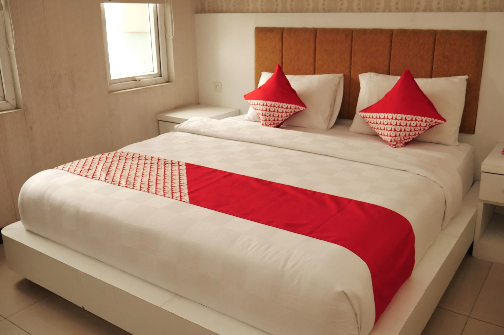 Фото Oyo 283 Helvetia Residence