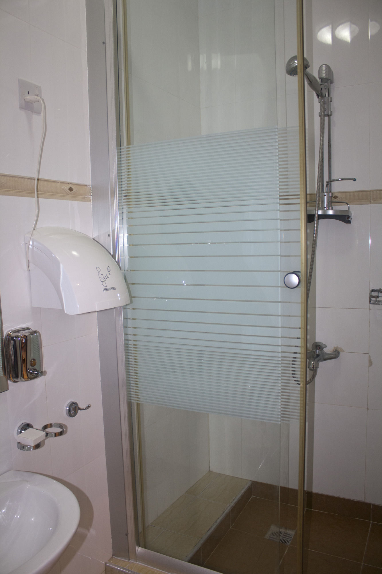 Фото At Home Boutique Hostel and Suite