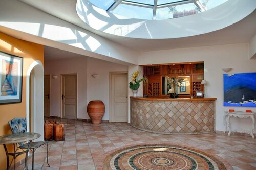 Гостиница Le Roc e Fiori Hotel в Порто-Веккио