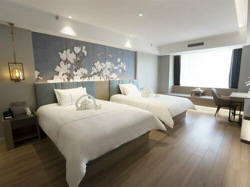 Гостиница Magnotel Hotel в Ляояне
